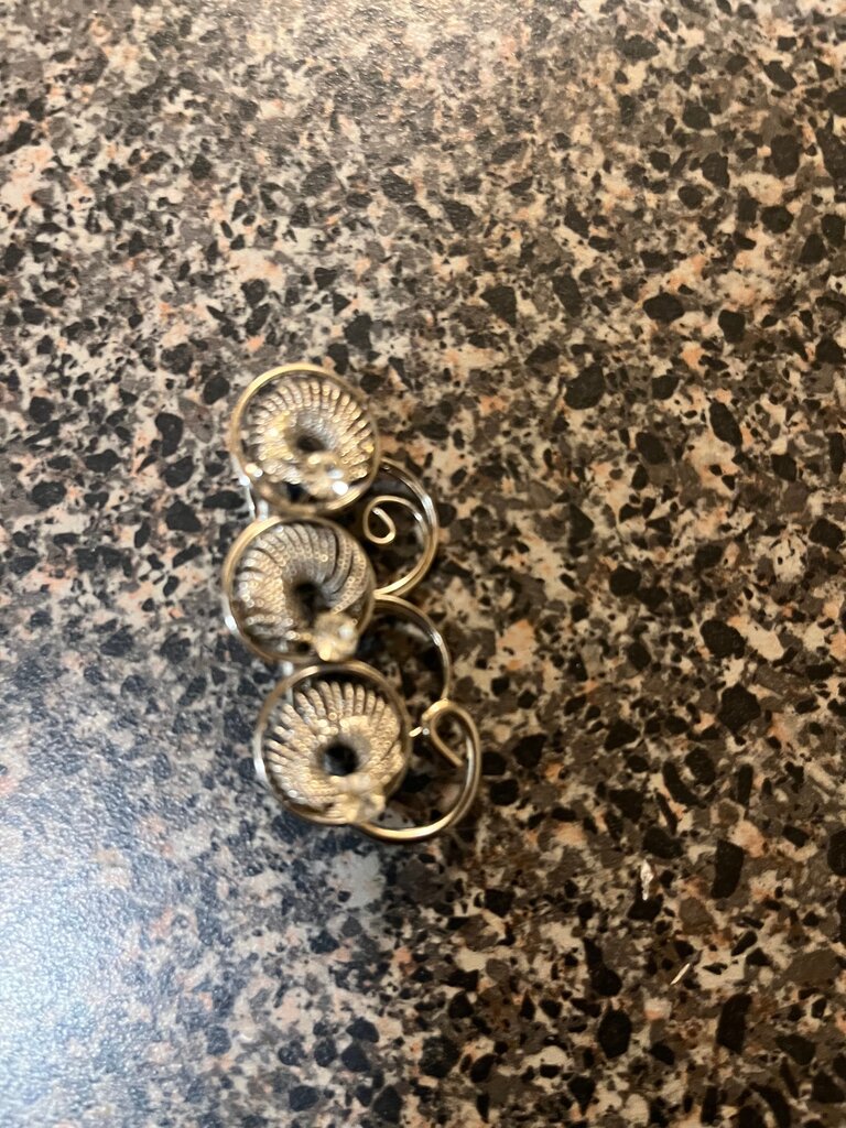 Silver Decorative Brooch with Three Circular Designs