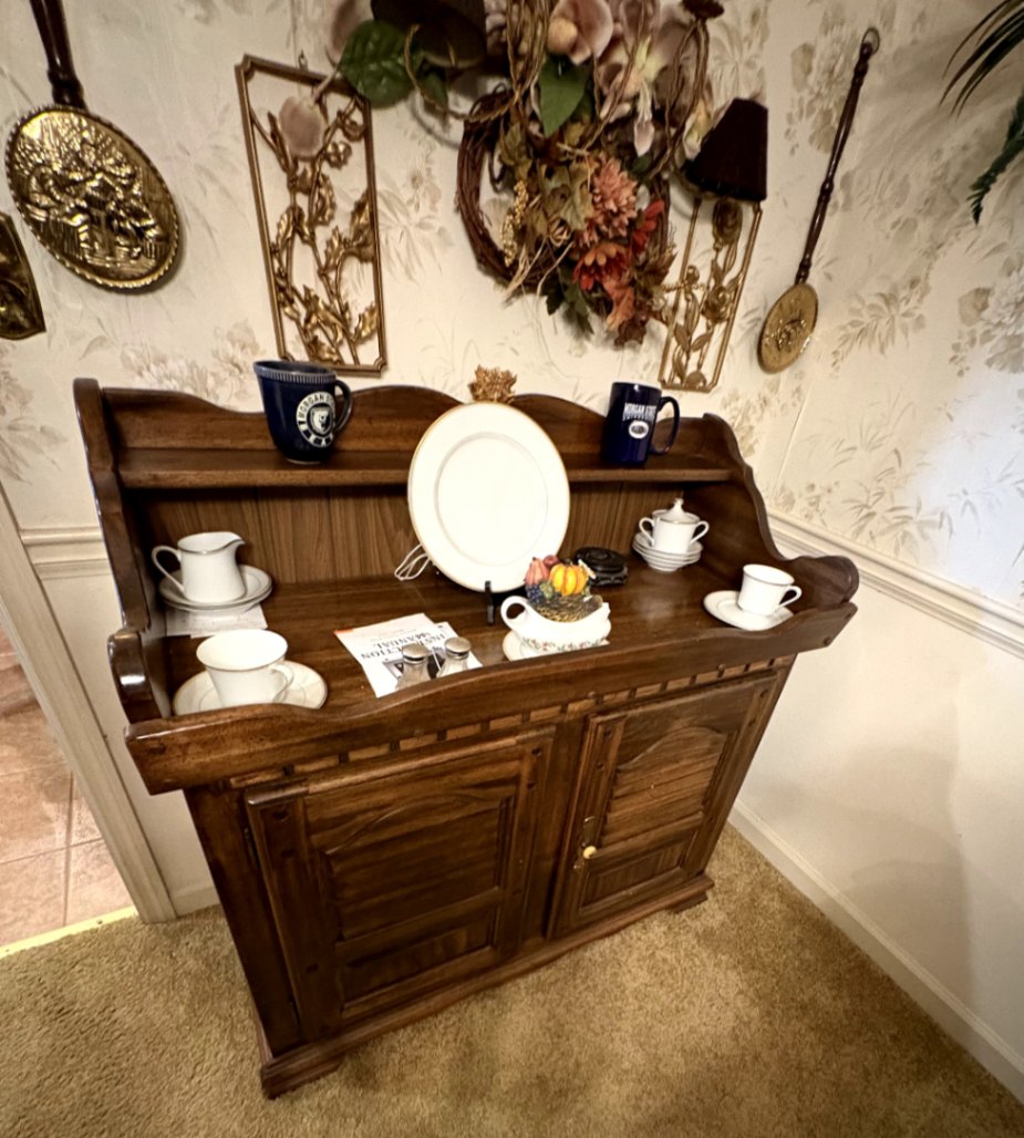Wooden Sideboard with Decorative Items