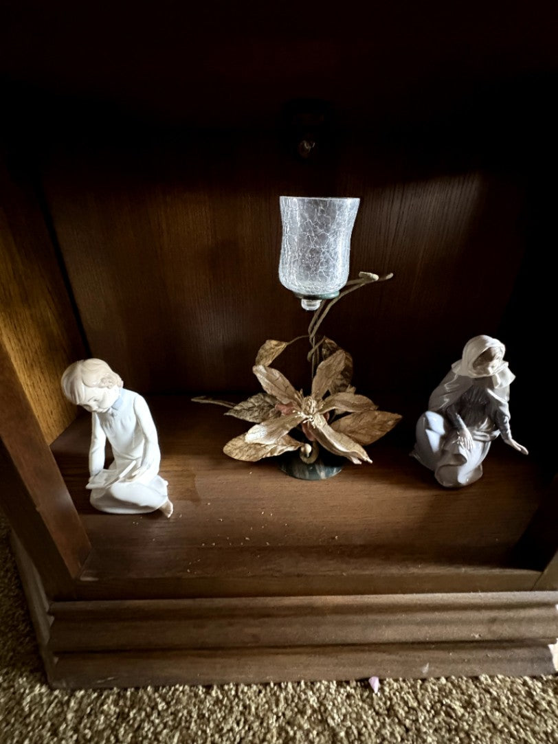 Decorative Figurines and Floral Arrangement