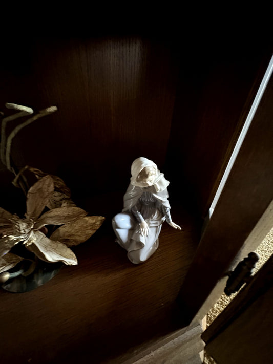 Porcelain Figurine of a Woman