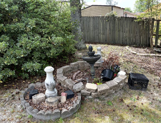 Garden Fountain with Surrounding Stones
