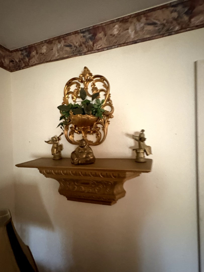 Gold Decorative Wall Shelf with Planter and Figurines