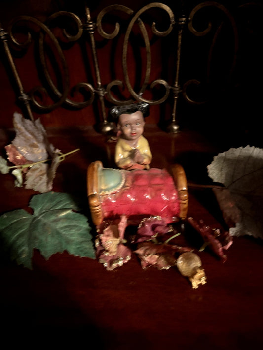 Vintage Figurine with Cradle