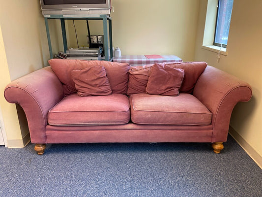 Pink Couch with Throw Pillows