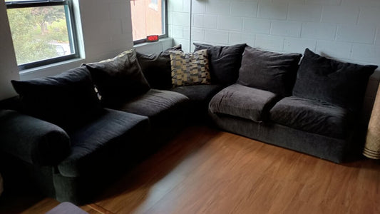 Stylish L-Shaped Sofa with Cushions