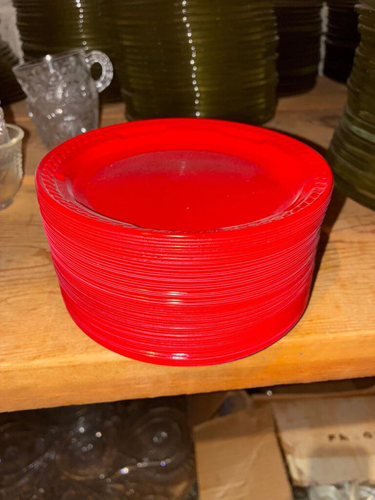 Stack of Red Plastic Plates
