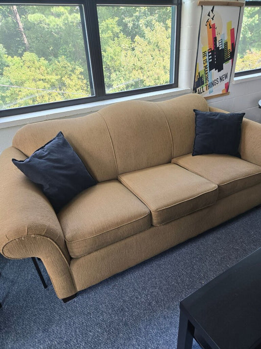 Tan Upholstered Sofa with Throw Pillows