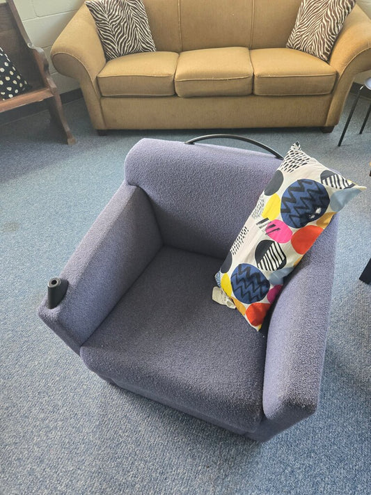 Purple Armchair with Colorful Pillow