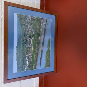 Framed Photograph of a River Town with Barges