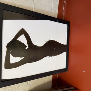 Framed Silhouette Photograph of a Reclining Woman