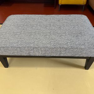 Modern Upholstered Ottoman with Abstract Pattern